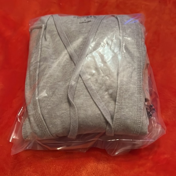 NY&Co Gray short sleeve hooded sweatshirt w/ a extended pocket & low V neck. - Picture 12 of 12